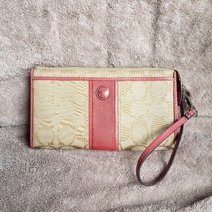 Pink and tan Coach wristlet/wallet